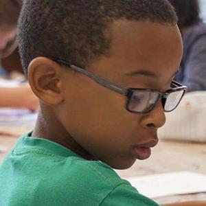 Young student working on school work